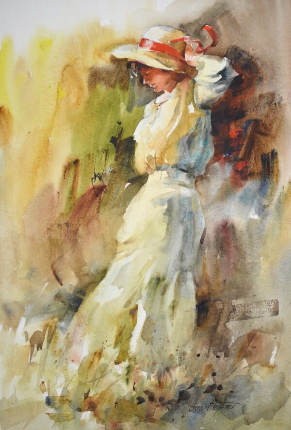 Watercolor painting depicting a woman standing with her back to the viewer, wearing a long dress and a wide-brimmed hat. She appears to be adjusting her hat, and her head is tilted downwards. The painting is rendered in soft, blended colors with visible brushstrokes, creating a sense of movement and depth. The background is abstract, with warm tones of yellow, brown, and green suggesting a natural setting. The artist's signature is visible in the bottom right corner.