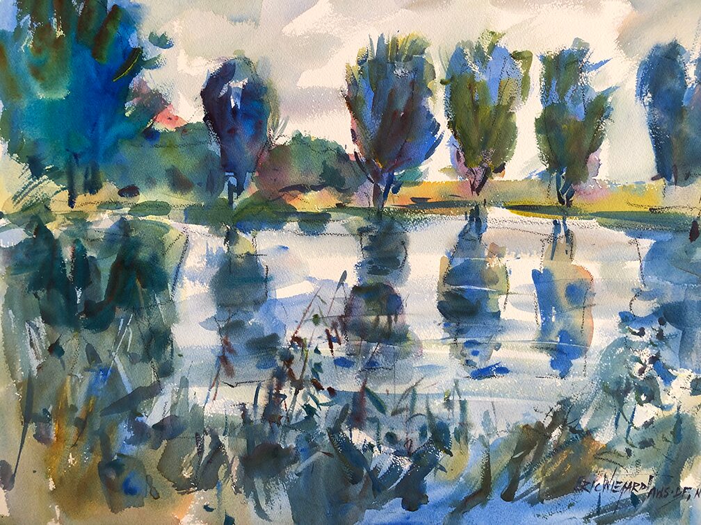 An impressionistic watercolor painting of a serene landscape scene. The foreground features tall reeds and grasses painted with loose, expressive brushstrokes. A broad body of water fills the middle ground, where it reflects a row of trees on the opposite bank. The reflections are a prominent feature of the painting, rendered with broad washes of blue, green, and brown. The overall style is painterly and atmospheric, with a soft, natural color palette.
