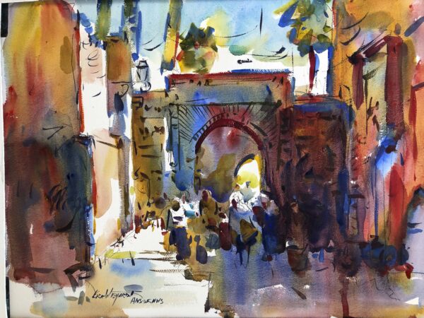 A vibrant watercolor painting of a bustling, sunlit street scene in a city, possibly in Morocco or Spain. The focus is a large archway in the center, with light streaming through it. The surrounding buildings are painted in warm, earthy tones of orange, brown, and red, with hints of blue. Several figures of people are visible in the foreground and beneath the arch, depicted with loose, impressionistic strokes. The painting has a dynamic, energetic feel.