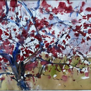 A loose watercolor painting of a winter tree filled with red berries. The trunk and branches are rendered in energetic blue and dark purple strokes. The berries are depicted as vibrant crimson blotches and splatters against a white background, with a warm ochre and olive green wash at the base suggesting a grassy field.