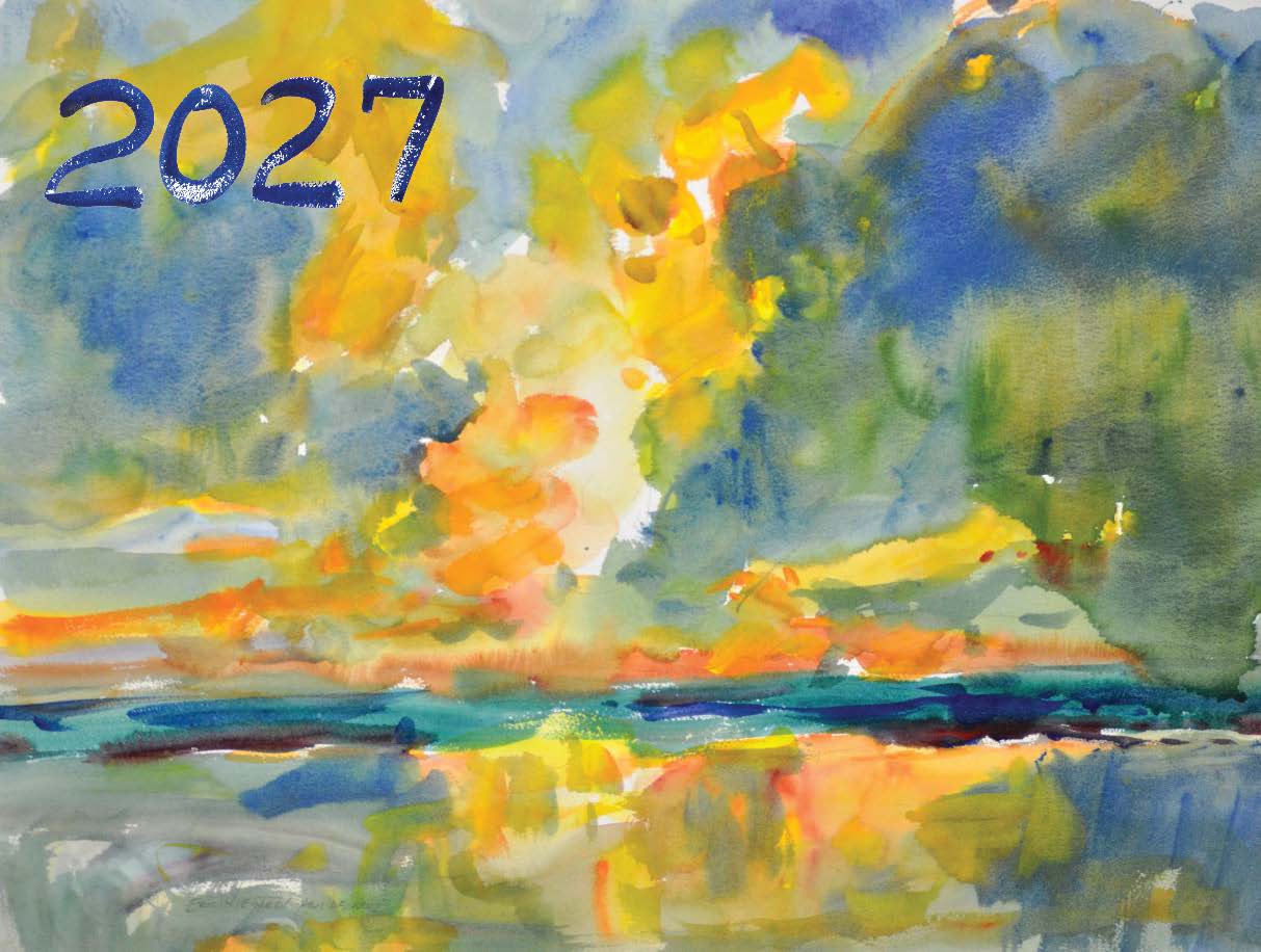 Watercolor calendar cover for 2027. The year appears in bold navy hand-lettered numerals in the upper left corner. The painting depicts a dramatic landscape with a radiant burst of golden-yellow and orange light at the center — suggesting a sunrise or sunset — surrounded by soft blue-green trees on both sides. The warm light reflects in loose, expressive strokes across a teal and blue body of water in the lower half of the composition.