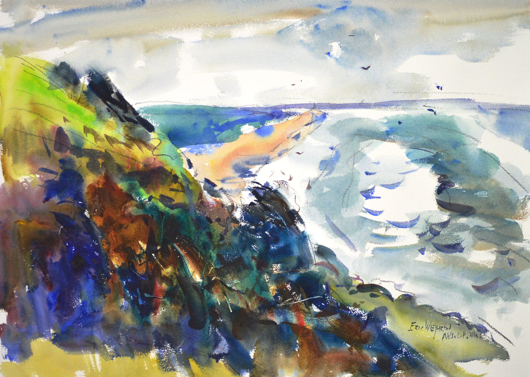 Watercolor coastal landscape with a steep green and rust-brown bluff filling the left side. A wide expanse of gray-blue ocean opens to the right beneath an overcast sky, with a pale sandy strip at the base of the headland and birds scattered across the sky.