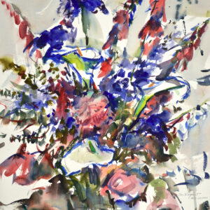 A dense floral arrangement of blue and violet blossoms, red foxglove spires, and pale pink roses rising against a soft gray background. Curving blue stems and dark green leaves knit the bouquet together, with touches of yellow-green at its heart.