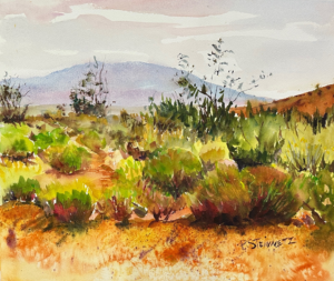 When I painted this scene I wanted to use strong desert colors and try and capture the rich red orange textures of the desert floor contrasting with the beautiful greens of the bushes.