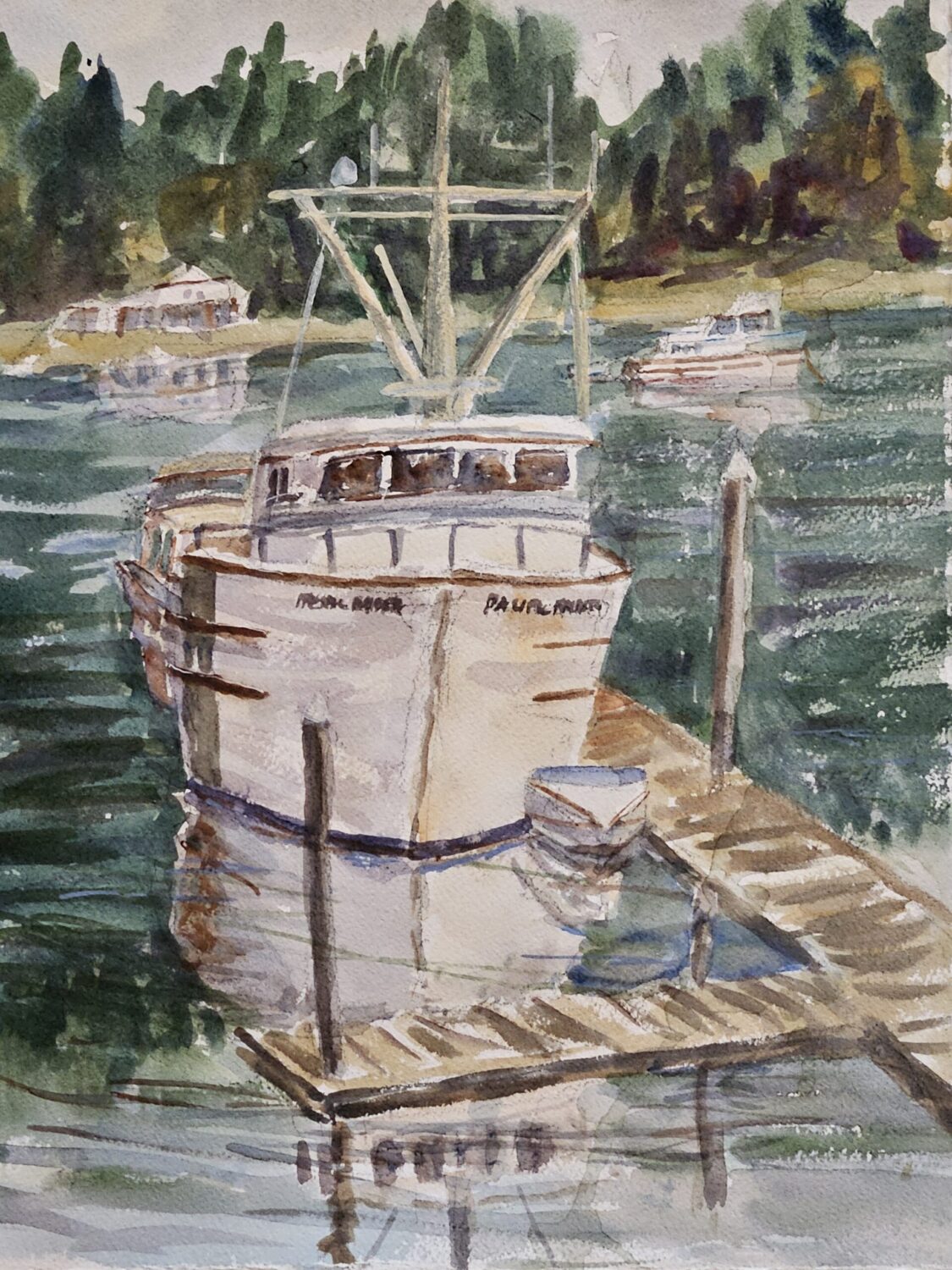 Pacific Raider, original watercolor painting of a fishing boat at a dock with a small boat right in front and two other fishing boats in the background. The water is dark and the shoreline in the background is covered with green trees.