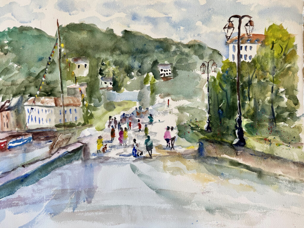 Walking out of the Park into Honfleur, original watercolor painting of people walking down a street into a town. There is a street light on the right and building and trees line the street. The sky above is cloudy.