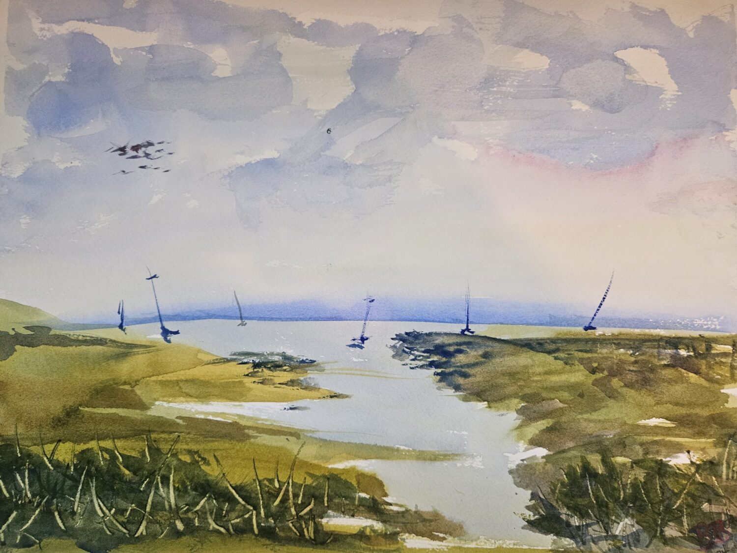 One the Edge, original watercolor painting of a bay with poles sticking out of the water. There is tideland and tidal grasses in the foreground and a blue landmass in the distance. The sky is cloudy with birds flying.