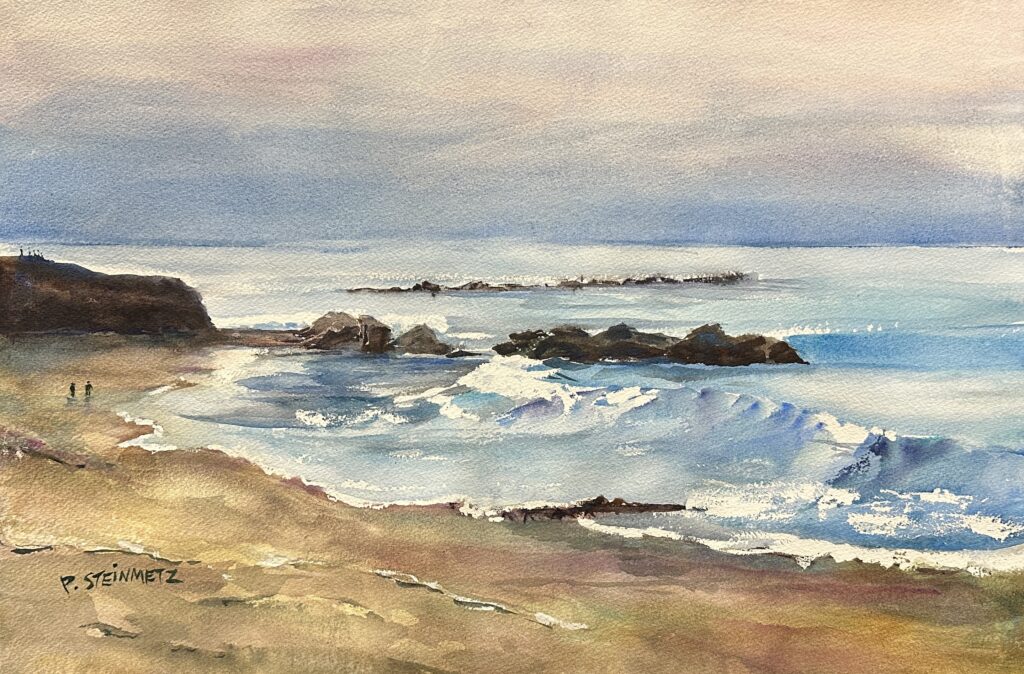 Evening Walk in Cambria, original watercolor painting of a couple people walking on a sandy beach with rocks jutting out into the water in the distance. The sky is cloudy and the waves are washing up onto the beach.